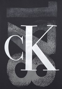 Calvin Klein Jeans VARSITY UNISEX - Majica kratkih rukava s printom - black