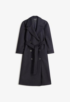 Navy wool blend coat with a double-breasted design, wide lapels, long sleeves, matching belt, and two large black buttons.