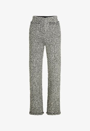 Pantalon en maille gris et noir tacheté avec taille élastique et jambes droites, détail de poche avant, tissu texturé.