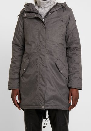 Giubbotto a compressione grigio con zip anteriore, cappuccio regolabile e due tasche laterali con chiusura a scatto. Presenta un tessuto testurizzato e una morbida fodera interna.