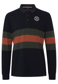 Polo majica dugih rukava u tamnoplavoj boji s horizontalnim prugama u maslinastoj i hrđavoj boji. Sadrži ovratnik i plaket s tri dugmeta, uz detalj logotipa.