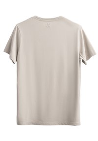 T-shirt in cotone beige con maniche corte, scollatura a girocollo e un piccolo logo impresso sul retro. Texture morbida e design semplice.
