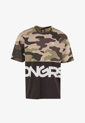 Rövid ujjú, kamuflázs mintás, pamut póló. Sötétzöld és bézs színek jellemzik, alján feltűnő fehér "ONGRS" felirattal.
