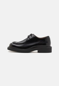 MOC TOE - Suvarstomi - noir