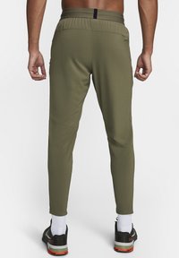Nike Performance Pantaloni sportivi - medium olive black black