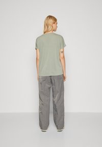 MSCH Copenhagen FENYA V NECK TEE - Tricou basic - green milieu