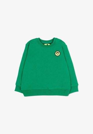 Sweat-shirt vert à manches longues pour tout-petit avec poignets côtelés, boutons-pression sur l'épaule et petit écusson jaune souriant sur la poitrine.