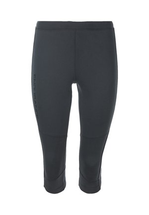 Leggings negros de tres cuartos de longitud, hechos de material elástico, con un diseño sin costuras y el logo 'ENDURANCE' en el costado.