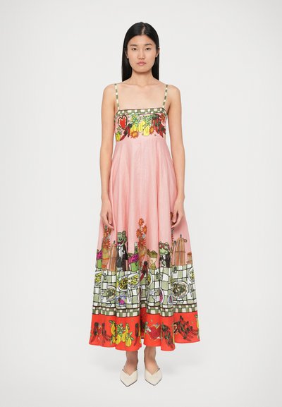 Pink maxi dress with a patterned bodice featuring floral and fruit designs, complemented by a graphic bottom showcasing whimsical food illustrations.