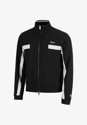 Giacca da track nera con colletto alto, zip frontale completa, accenti di pannelli bianchi, polsini a coste e vita elasticizzata. Il materiale sembra liscio.