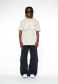Lost Youth DOVE - Triko s potiskem - sand