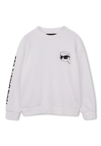 Λευκό φούτερ με μαύρο γραφικό πρόσωπο με γυαλιά ηλίου στο στήθος και μαύρο κείμενο στο μανίκι. Μαλακό ύφασμα, άνετη εφαρμογή.