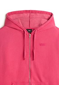 Felle roze zip-up hoodie met een gevoerde binnenkant, trekkoorden bij de capuchon en een geborduurd logo op de linkerborst.
