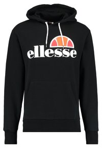 Svart huvtröja tillverkad av bomullsblandning. Har en ficka fram, snodd på huvan och en stor vit "ellesse"-logotyp med en färgad båge.