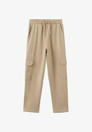 Pantalon cargo beige en tissu doux et texturé. Comprend une taille élastique, un cordon de serrage et des poches latérales avec rabats.