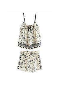 Lichtgewicht tweedelige set bestaande uit een top met spaghetti bandjes en shorts. De stof is crèmekleurig met een zwart patroon van harten, sterren en speelse ontwerpen.