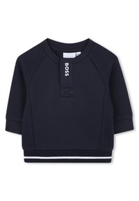 Navyblauwe cropped sweatshirt met een geribde structuur, raglanmouwen, een voorpaneel met logo en witte streepaccenten aan de zoom.
