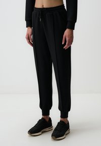HIGH WAIST JOGGER  - Jogginghose - black