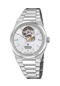 Reloj de acero inoxidable con un dial texturizado en plata, diseño con esqueletos que muestra la mecánica y una pulsera pulida. Incluye cristal de zafiro.