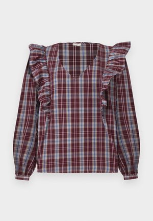 Maroon en blauwe geblokte blouse met ruches aan de mouwen, V-hals en lange ballonnenmouwen. Lichtgewicht stof met een geruit patroon.