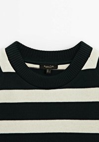 Black ribbed sweater featuring horizontal cream stripes, crew neck design, and a tag with brand and size information.