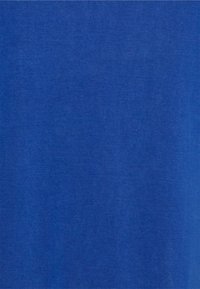 Blue fabric with a smooth texture, uniform color, and no visible patterns or accents. Suitable for casual wear or layering.