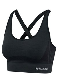 Brassière de sport noire avec bretelles réglables croisées et logo hummel sur la bande inférieure, fabriquée en tissu sans couture et respirant.