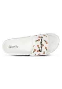 White slide sandal with a wide strap featuring a pineapple pattern and a black logo. Flat sole made of smooth material.