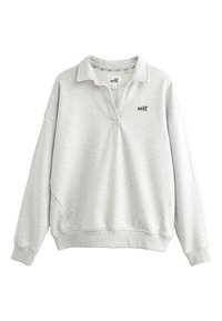 Helehall hall kapuutsiga pusa, millel on väike vasakul rinnal tikitud must logo ning soonilised varrukaääred ja alläär.