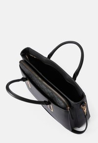 Black leather handbag with a zippered compartment, smooth texture, structured shape, and gold-tone hardware, featuring an embossed pattern inside.