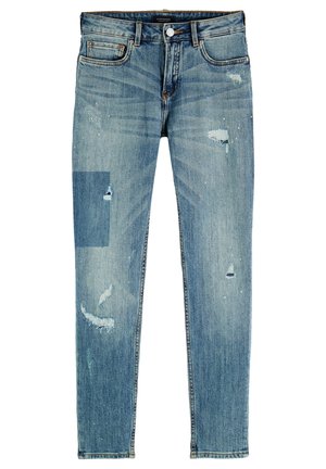 Blue denim skinny jeans with a faded wash, distressed patches, and minor fraying. Features classic five-pocket design and a zip fly.