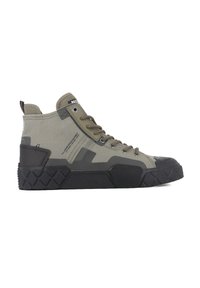 Mid-top sneakers in olive green canvas with black rubber accents. Features reinforced toe, textured outsole, and prominent lacing system.