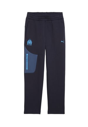 Pantalones de chándal en color navy con un bolsillo de acento azul, cinturilla elástica, que presentan el logo de Marsella y el logo de Puma en azul claro. Textura de tela suave.