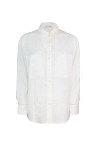 Camicia in lino bianco con colletto classico, chiusura frontale con bottoni e due tasche sul petto. Maniche lunghe con polsini abbottonati. Texture liscia.