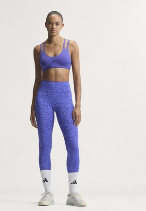 adidas Performance, Optime Strappy Light Support - Brassières de sport à maintien léger - pure purple