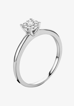 Silberring mit einem runden Cluster aus kleinen, klaren Edelsteinen, die in Krappen gefasst sind. Der Ringband ist schlank und poliert.