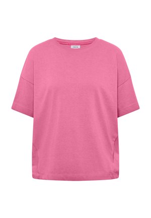 Haut décontracté à manches courtes de couleur rose avec encolure ronde, coupe ample et détails sur les coutures latérales, présenté sur un fond blanc.