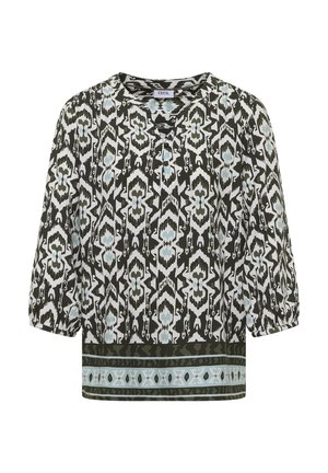 Bluzka z długim rękawem z czarno-białym i niebieskim geometrycznym kwiatowym wzorem oraz dekoracyjnym poziomym paskiem przy dolnym brzegu, okrągły dekolt.