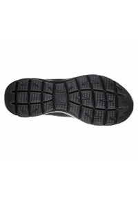 Sole di scarpa sportiva nera con un motivo testurizzato, caratterizzata da distintive creste di gomma e scanalature flessibili per trazione e stabilità.