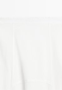 Plain white long-sleeve shirt with a wide squared neckline and a loose fit.