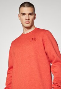 Under Armour ICON FLEECE - Sudadera - earthen orange/light heather