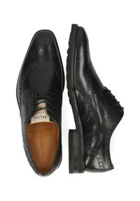 Scarpe eleganti in pelle nera, caratterizzate da una punta affusolata, dettagli brogue raffinati e una superficie liscia con un tacco basso e robusto.