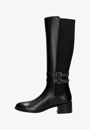 - Kowbojki i obuwie motocyklowe