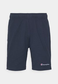 Pantalones cortos atléticos en color marino, hechos de una tela suave, con una cinturilla elástica. Logo de Champion bordado destacado en colores contrastantes en la pierna.