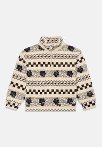 Pullover in fleece con colletto a zip quarti di colore crema, caratterizzato da motivi geometrici e floreali neri, dettagli a coste e una consistenza morbida.