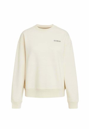 Felpa color crema realizzata in tessuto morbido, con collo tondo, polsini a coste e il logo "GUESS" in lettere scure sul petto.
