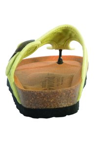Infradito giallo con una cinghia texturizzata, suola in sughero e suola esterna in gomma nera. Caratterizzato da un post centrale per le dita per una vestibilità sicura.