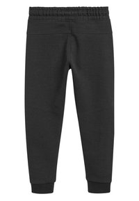 Sorte bomulds sweatpants med elastisk talje, smalnede ben og ribbede manchetter. Glat tekstur, ingen synlige mønstre eller hardware.