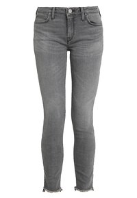 Grå slim-fit jeans med medelhög midja, knapp- och dragkedjestängning, fem fickor och fransade fållar vid anklarna.