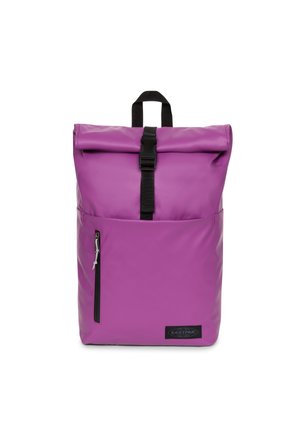 Purple roll-top backpack with a zippered front pocket, black hardware, and logo patch. Made from a smooth, durable fabric. Adjustable straps.